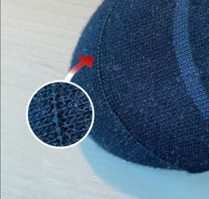 Tå syningen på en strømpe